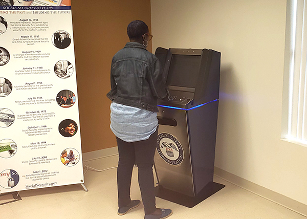 Self-service Kiosk in use at Social Security office