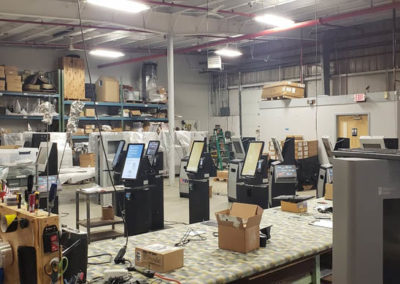 Production Floor with Ticketing Kiosks being assembled