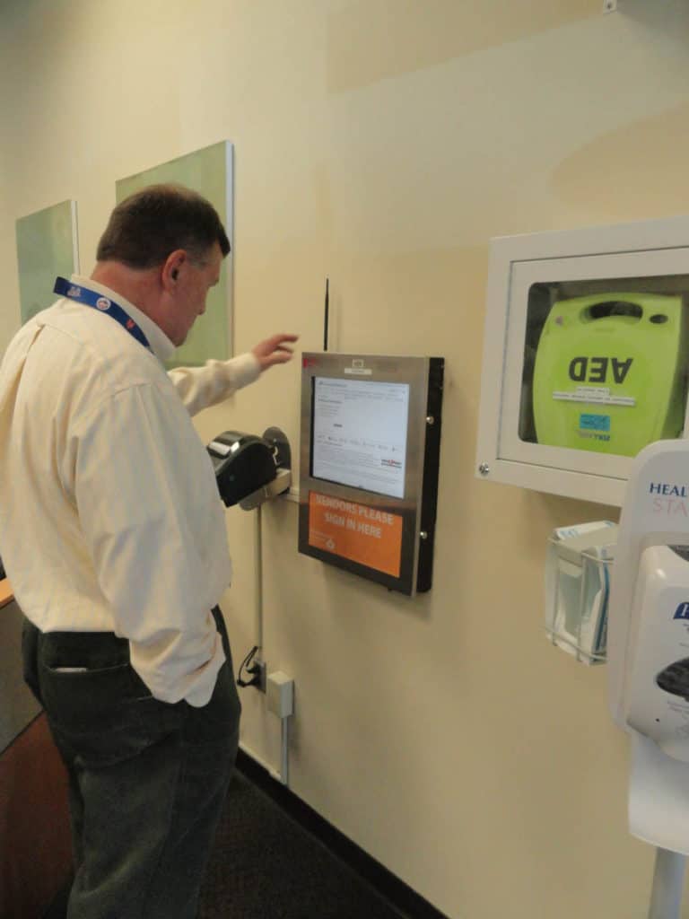 Wall Mounted Interactive Check-in kiosk for visitors