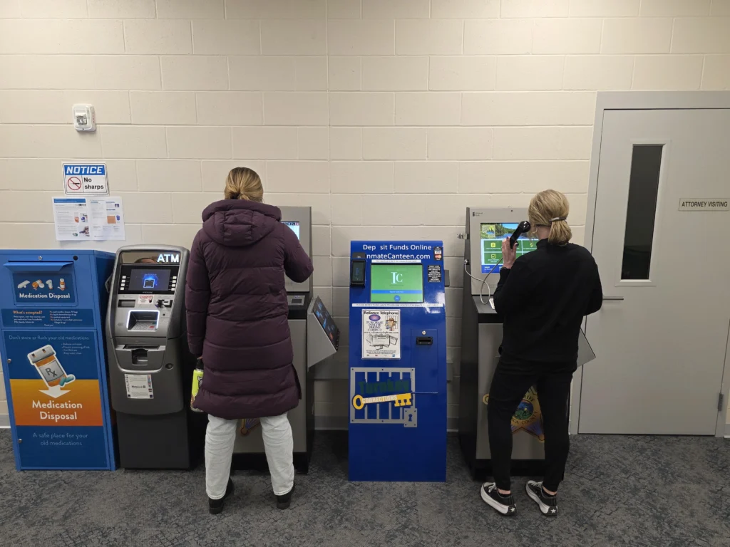 Residents using self-service kiosks