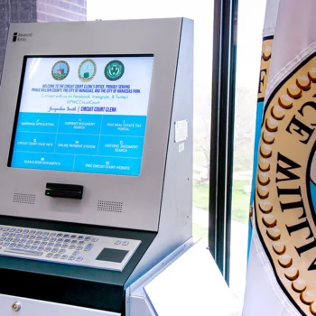 Prince William County Circuit Court self-service kiosk and flag Prince William County Circuit Court self-service kiosk and flag