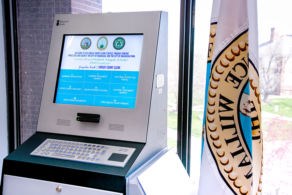 Prince William County Circuit Court self-service kiosk and flag