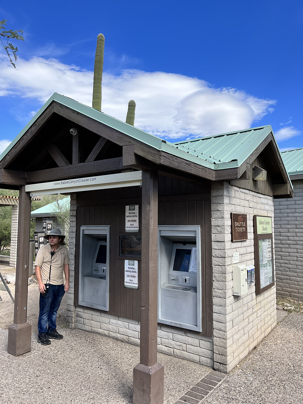 Thru-wall shuttle ticket kiosks
