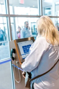 Citizen using smart police station kiosk