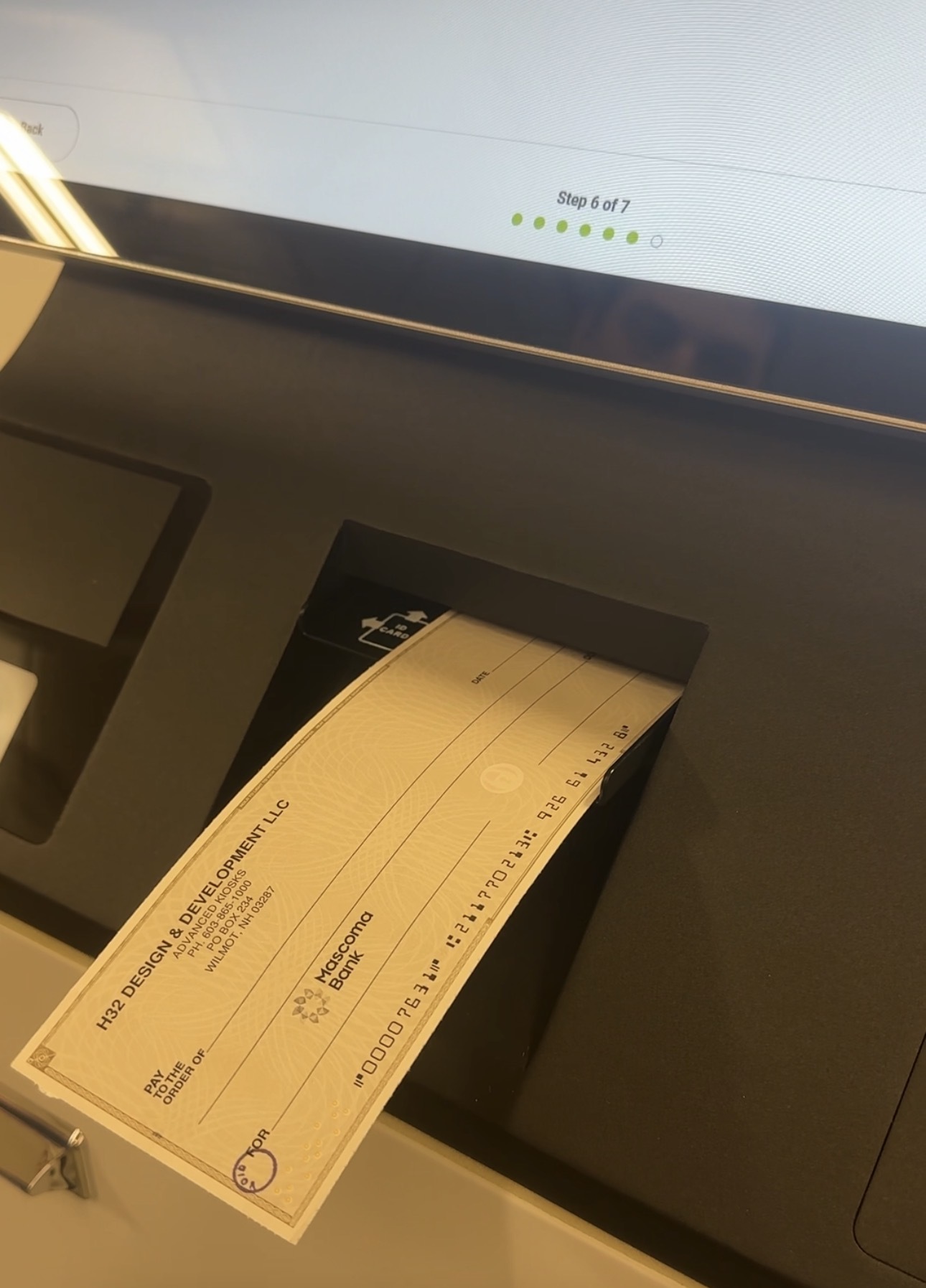 Vault Payment Kiosk Accepting a Check