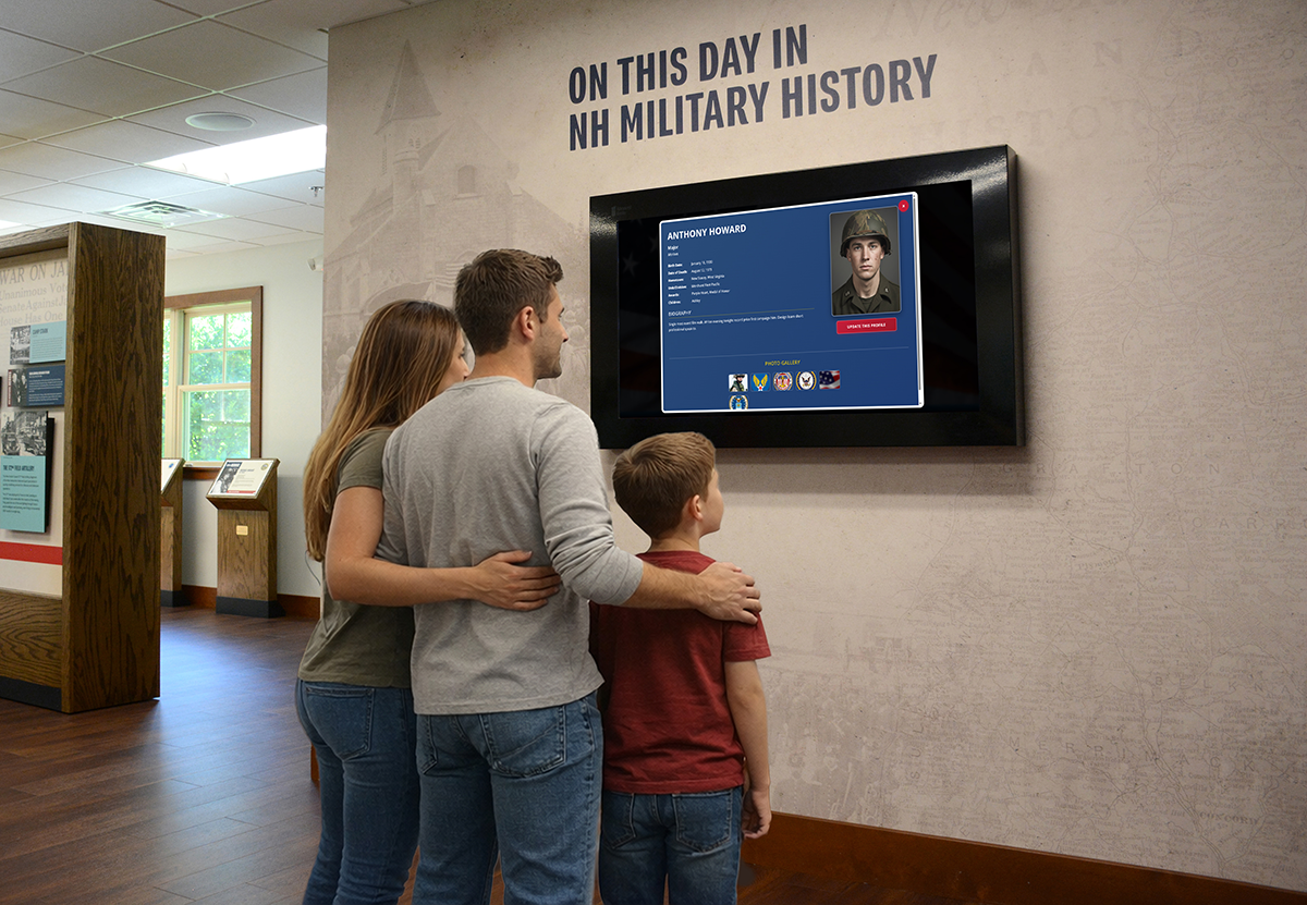 Family at Tribute Station wall-mounted kiosk interactive memorial