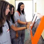 College Informational Freestanding Kiosk In Use