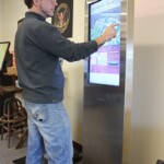 Merchant Max Kiosk with Overhead LED Lighting in Use